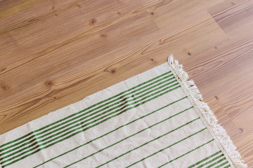 fluffy carpet on wood floor,carpet on the floor. Warm interior design