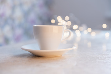 Cup of hot chocolate with christmas decorations on the rustic background. Selective focus. Shallow depth of field.