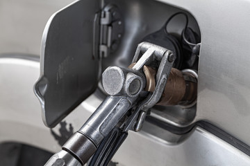 LPG filling of SUV car on a gas station