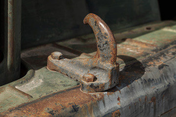 Close-up photo of a transportation hook, old truck