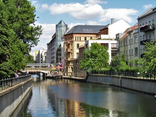 Naklejka premium Berlin diverse Architecture under the spring sun shining. Building are a beautiful contrast of Patterns, shapes and colors from regular to mixed styles in harmony