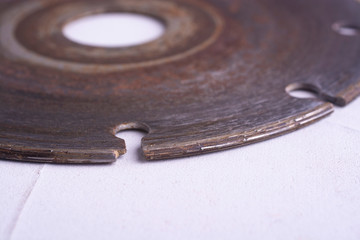 Old used diamond blade close up.