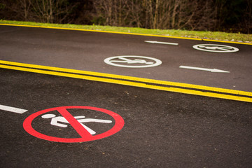 No Pedestrian Crossing Traffic Sign on modern wide smooth empty asphalt highway street stretching to horizon. Speed, safety, comfortable journey and professional road building concept.