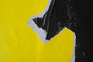 Yellow and black crumpled paper. Abstract background.