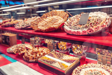 Counter in the store of Oriental sweets with dessert baklava