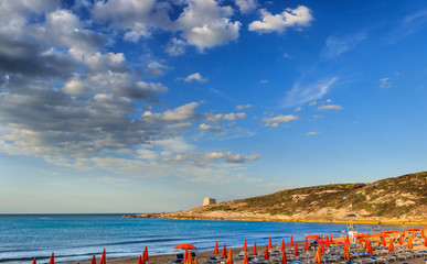 The most beautiful beaches of Apulia: Cala Lunga Beach, enclosed by two rocks, stretches a few kilometres away from Peschici, in Gargano, Italy.