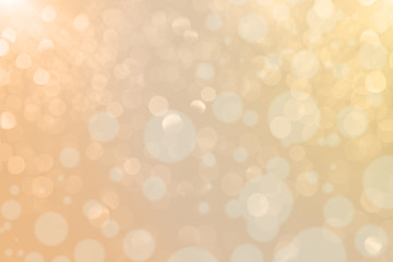 Abstract blurred gold bokeh soft light background and texture. Christmas and Happy new year on...