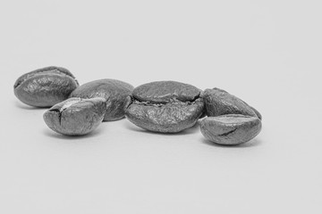 Close up of coffee beans on a white background