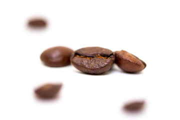 Close up of coffee beans on a white background