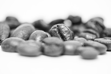 Close up of coffee beans on a white background