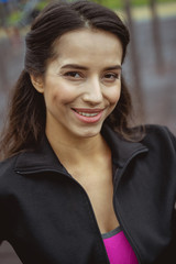 Portrait of delighted woman that looking at camera