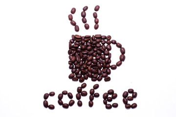 Cup of coffee and the word coffee created with coffee beans