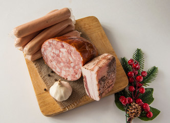 Meat cutting on a board, lard on white background. Top view