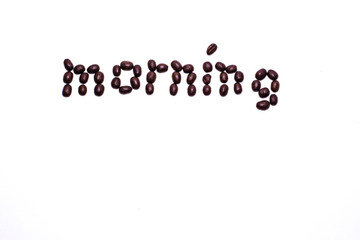 Word morning created with coffee beans
