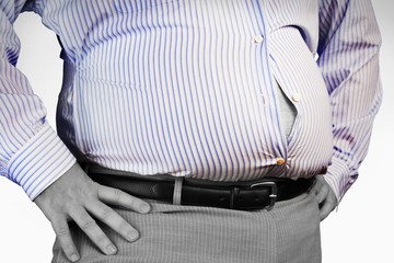 Midsection Of An Obese Man Wearing Tight Formal Shirt