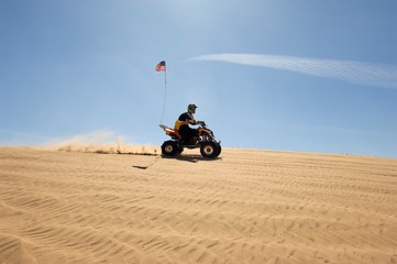 Man Riding Quad Bike In Desert © MDBPIXS