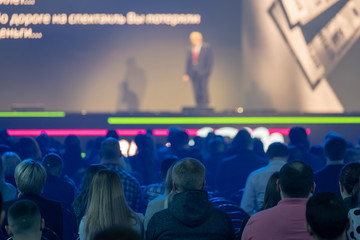 Audience listens to the lecturer at the conference