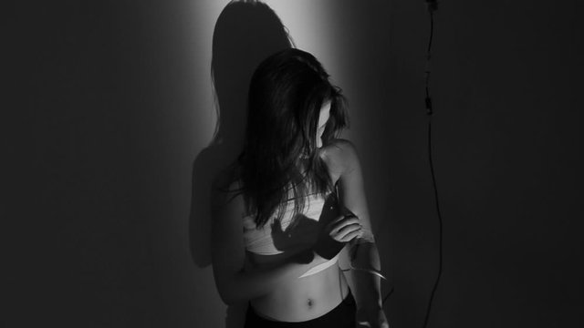 Portrait of a drug addict girl. Breaking a drug addict.