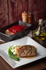 meat loaf with mashed potato and asparagus