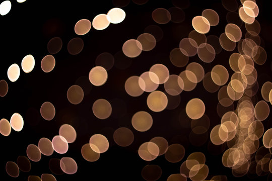 Photo of bokeh lights on black background. Perfect for overlay.