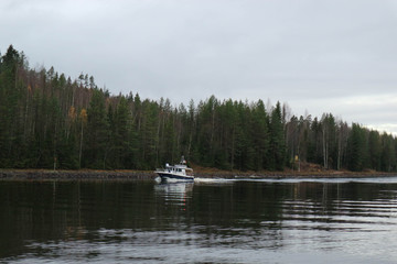 Fototapeta na wymiar small boat in the Saimaa canal