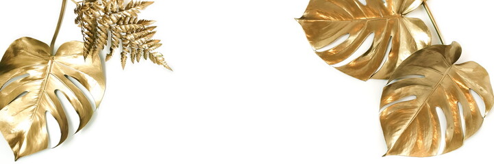 Gold leaves plant tropical palm, monstera  pattern frame isolated on a white background. Banner....