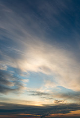 Fantastic clouds at sunrise, vertical panorama