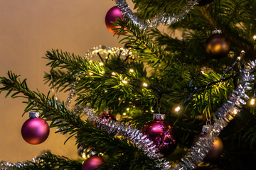 atmospheric, colorful Christmas decoration with fairy lights and shiny Christmas balls