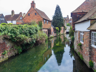 Fototapeta na wymiar Houses along The Great Stour, the river that flows in the town of Canterbury