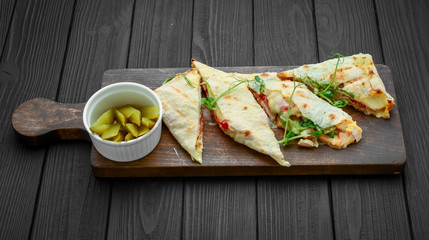 Shawarma traditional Middle Eastern snack. On wooden background