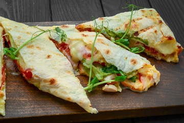 Shawarma traditional Middle Eastern snack. On wooden background