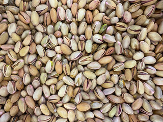 Texture of salted pistachios closeup