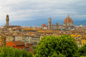 Obraz premium Aerial view of Florence Italy, beautiful old city full of historical amazing buildings, cathedrals and bridges. 