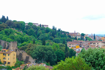 Fototapeta na wymiar Aerial view of Florence Italy, beautiful old city full of historical amazing buildings, cathedrals, old walls and bridges. 
