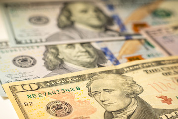 Close up of different dollar bills as background. Amarican dollars pattern. Top view of business concept.