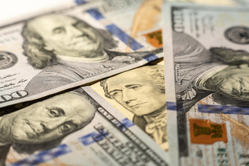 Close up of different dollar bills as background. Amarican dollars pattern. Top view of business concept.