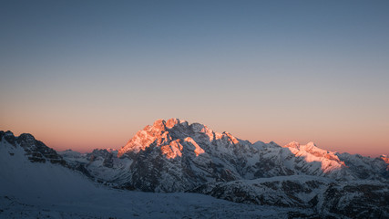 Colorful winter sunrise in mountains. Wide background. 