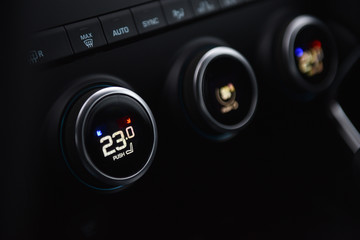 panel of a car with temperature controls