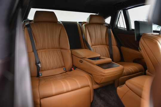 Rear leather seats in luxury car.