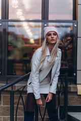 Close up evening urban outdoor portrait of fashionable beautiful blondie model. Beauty, modeling...