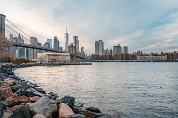 Fototapeta premium New York City Skyline at dusk, Brooklyn Bridge, Manhattan