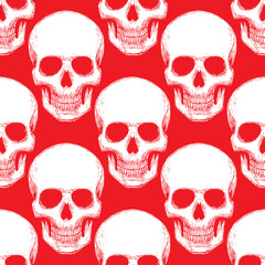Seamless pattern with hand drawn skulls. Vector Illustration