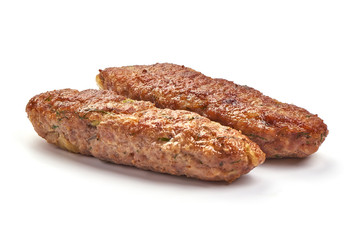 Fried english breakfast sausages, isolated on white background