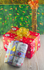  Christmas packages with gifts of red, green and blue