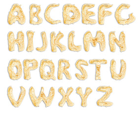 English letters from pancakes on a white background