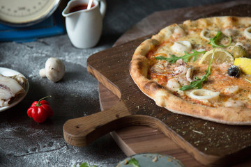 Italian pizza with squid and shrimp