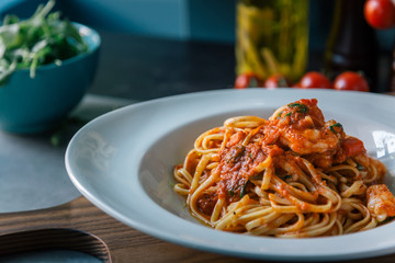 Mouth-watering pasta with tomato sauce and shrimps