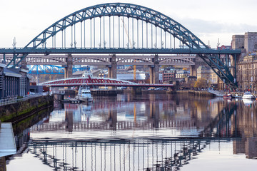 Fototapeta na wymiar Bridges mirrored in the River Tyne, Newcastle, UK