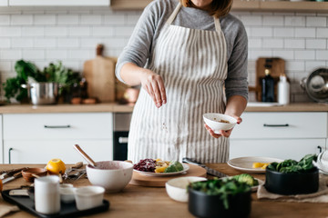 Cook preparing salad