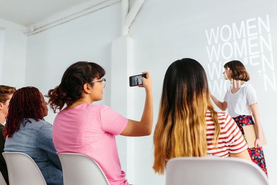 People in a conference about feminism.